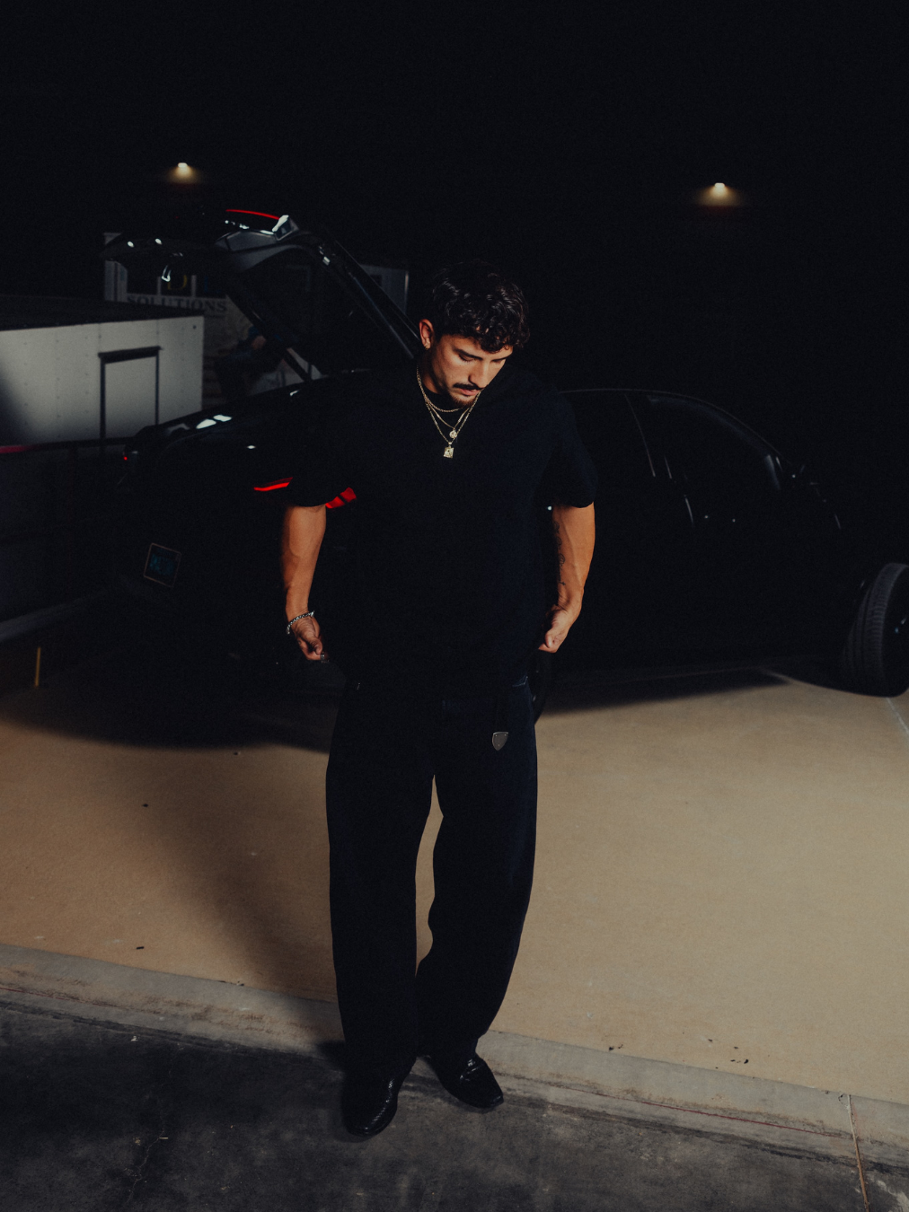 Model in the black classic crew tee, full length