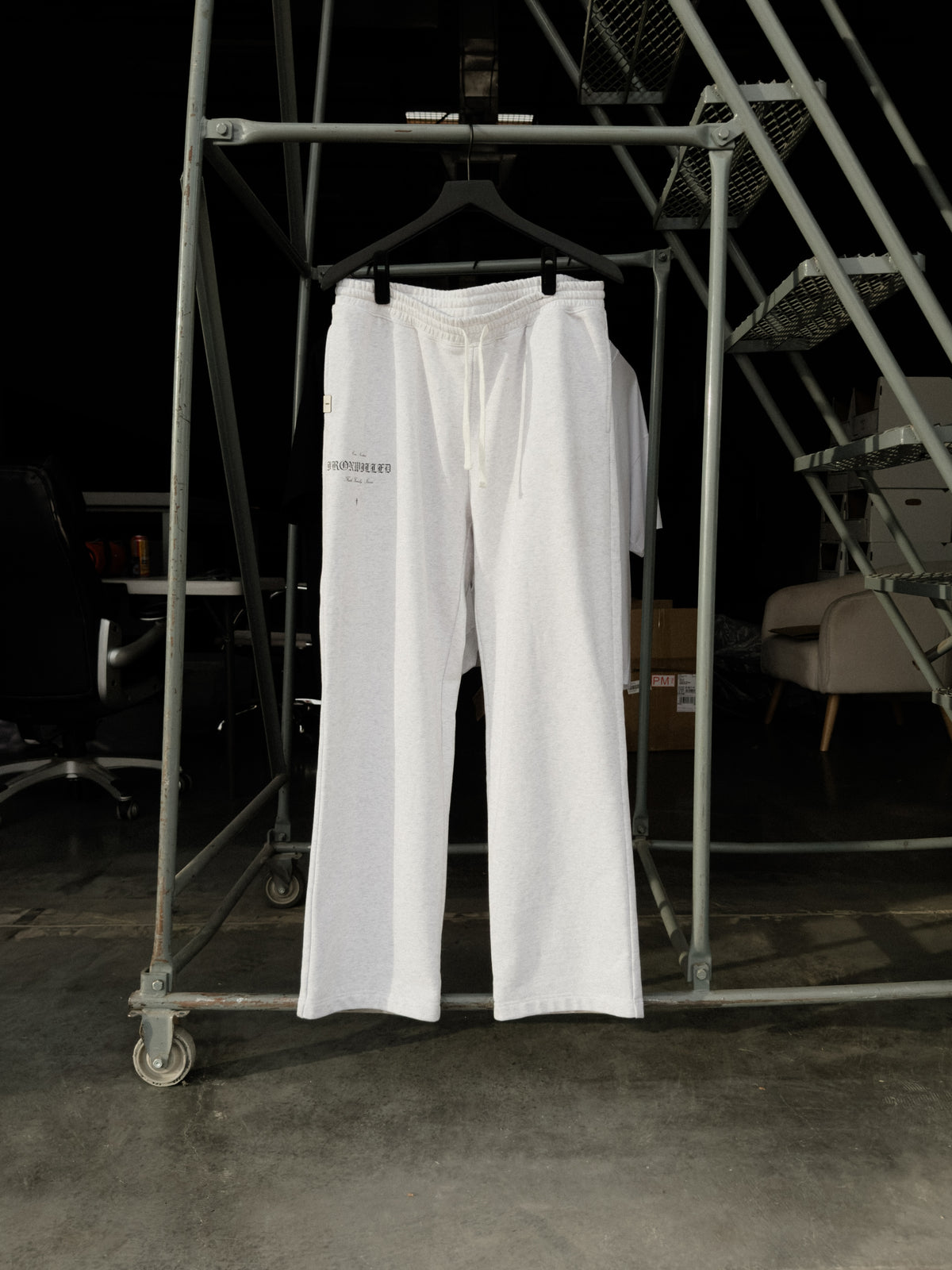 Heritage relaxed sweatpants hanging on a rack