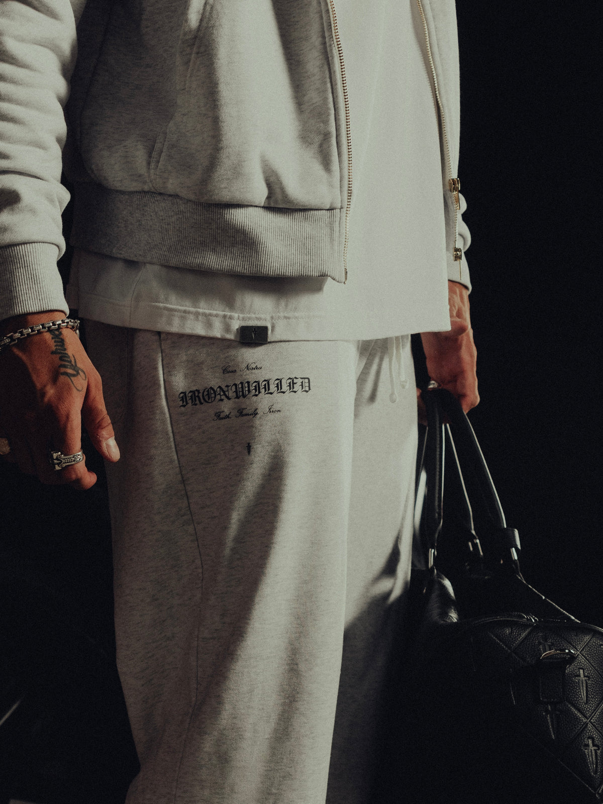 Close-up of the Ironwilled graphic on the leg of the Heritage sweatpants
