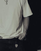 Sleeve and body of the white classic crew tee