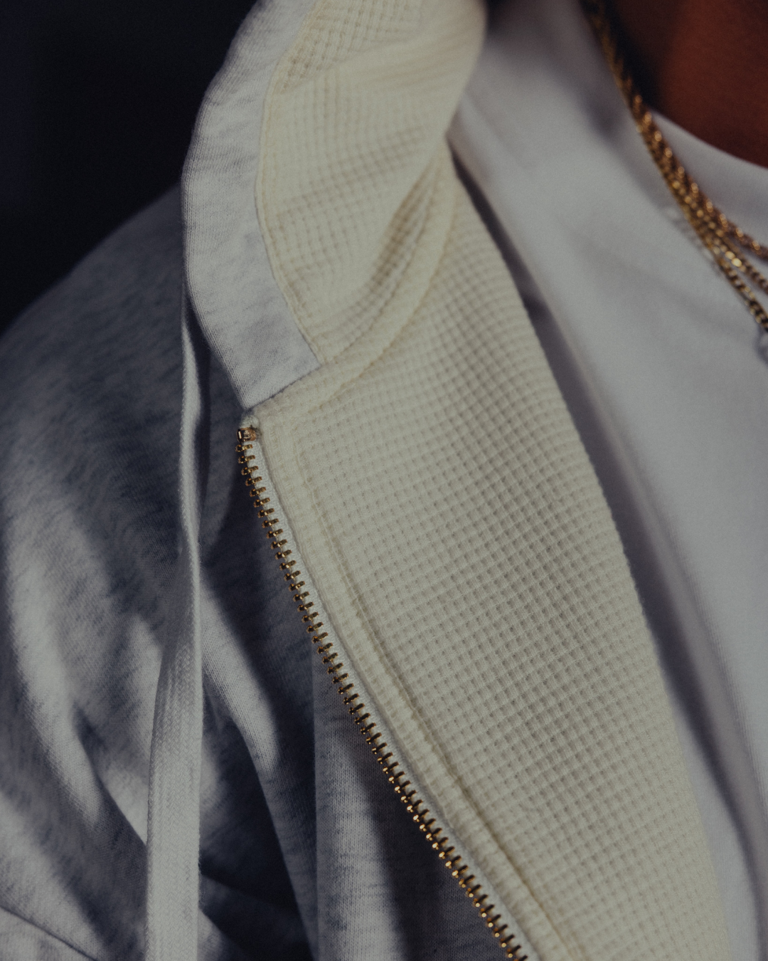 Detail of the waffle-knit lining and golden zip