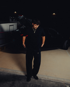 Model in the black classic crew tee, full length