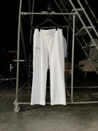 Heritage relaxed sweatpants hanging on a rack