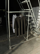 Black classic crew tee on a hanger