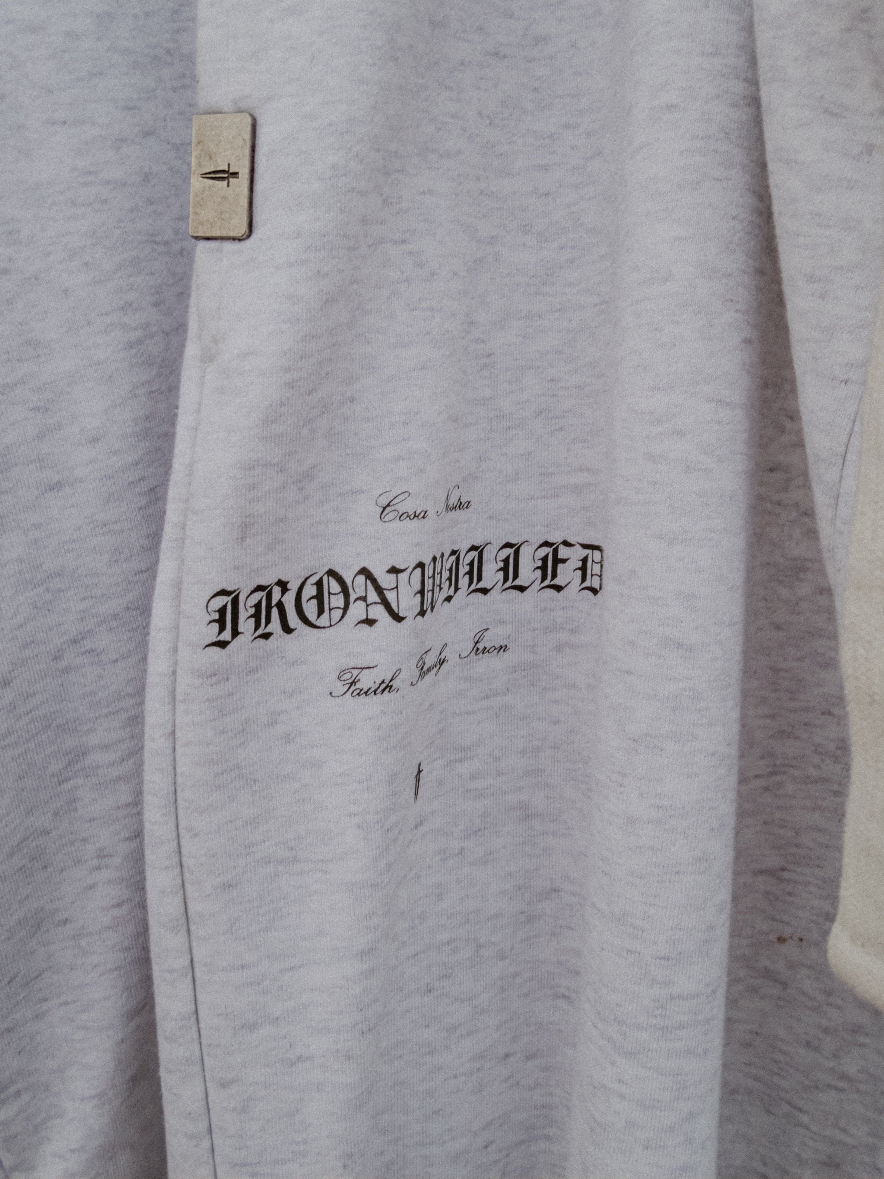 Signature metal tab and Ironwilled graphic on the sweatpants