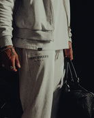 Close-up of the Ironwilled graphic on the leg of the Heritage sweatpants