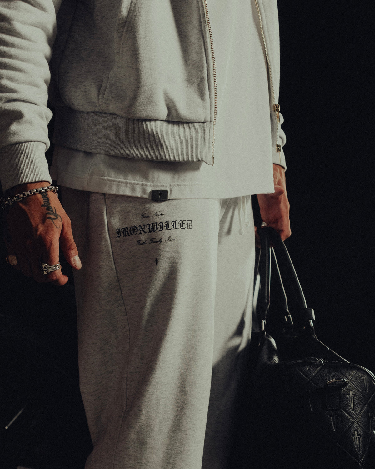 Close-up of the Ironwilled graphic on the leg of the Heritage sweatpants
